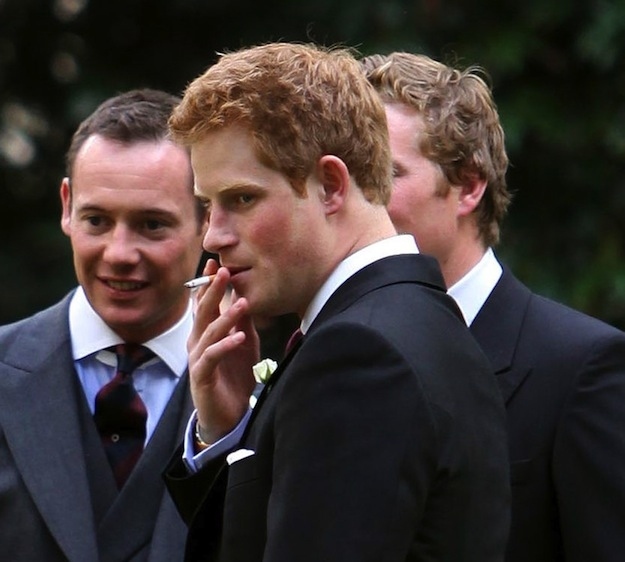 Prince Harry smoking a cigarette (or weed)
